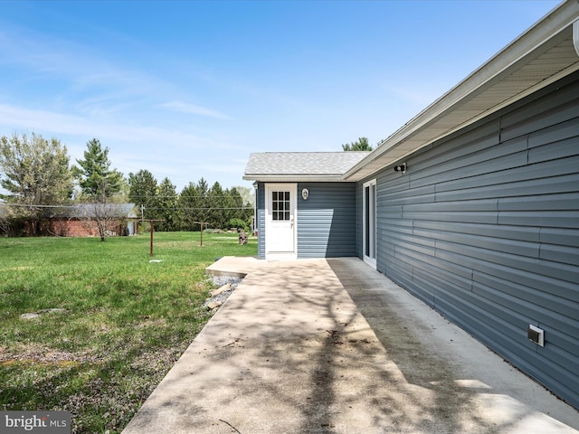 view of patio / terrace featuring fence