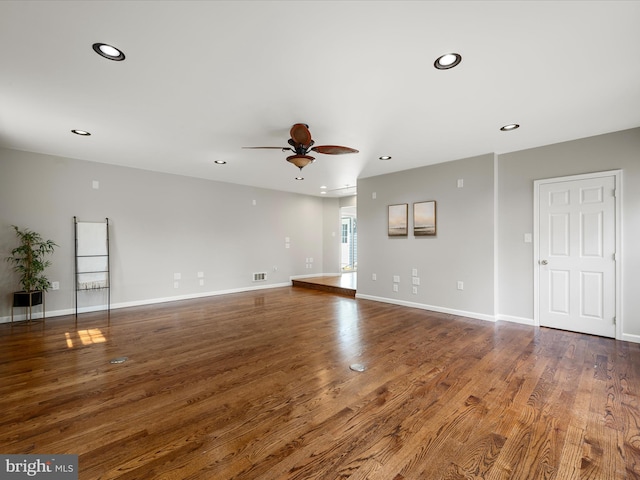 unfurnished living room featuring wood finished floors, baseboards, a ceiling fan, and recessed lighting