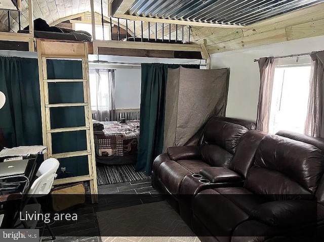 living room with lofted ceiling and wooden ceiling