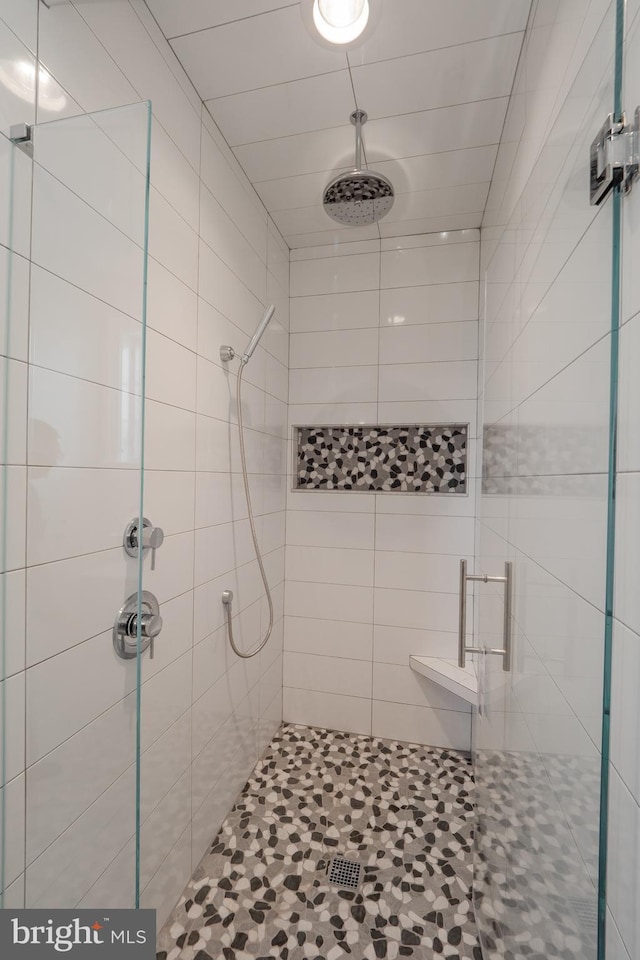 full bath featuring a stall shower