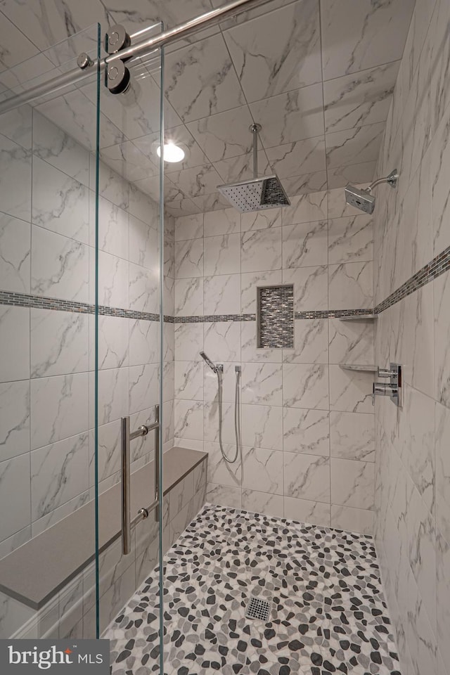 bathroom with a stall shower