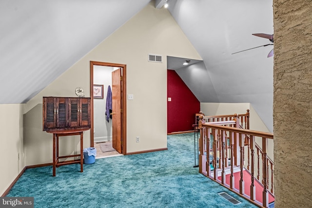 bonus room featuring vaulted ceiling, a ceiling fan, visible vents, and carpet floors