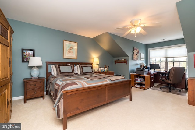 bedroom with light carpet, ceiling fan, visible vents, and baseboards