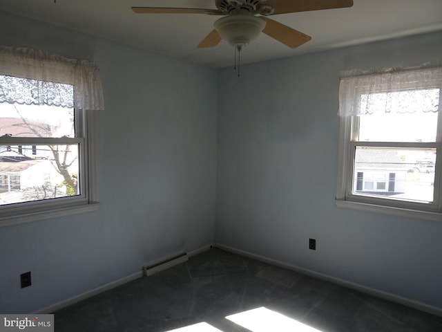 unfurnished room with baseboards, baseboard heating, and carpet floors