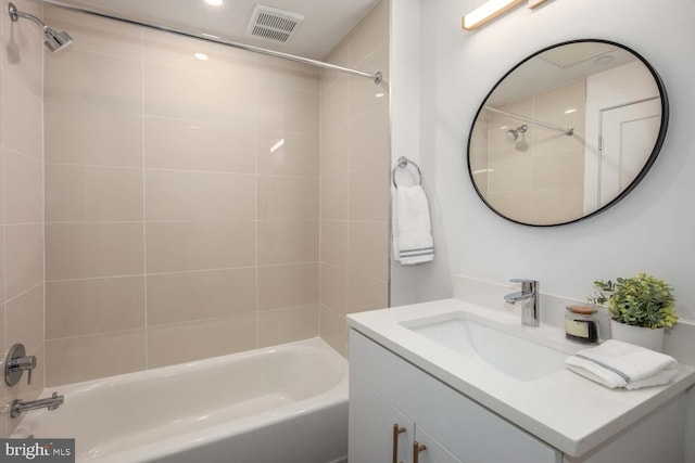 full bath with tub / shower combination, vanity, and visible vents