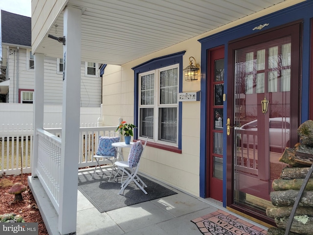 property entrance with a porch