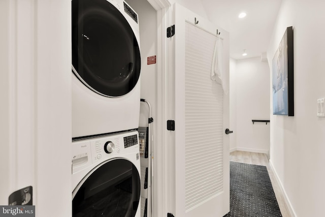 1500 Harry Thomas Way NE Unit 501, Washington, DC 20002 - washroom featuring laundry area, stacked washer and dryer, recessed lighting, and baseboards