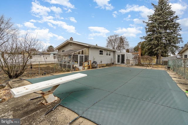 view of pool with a patio area and a fenced backyard