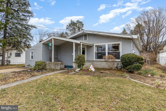 bungalow with a front yard