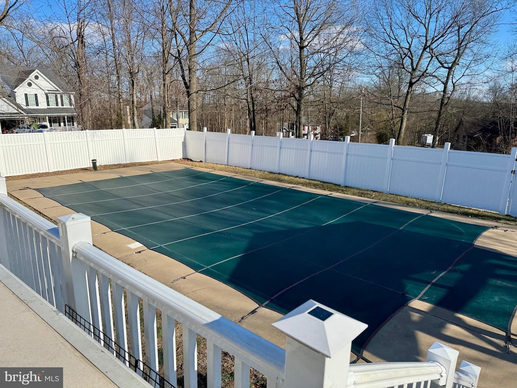 view of pool featuring a fenced in pool and a fenced backyard