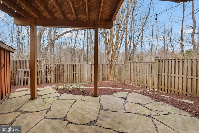 view of patio with a fenced backyard