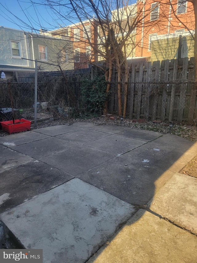 view of patio with fence