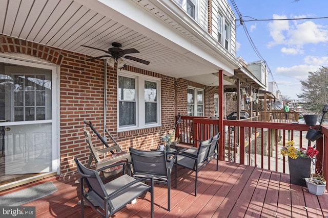 deck featuring a ceiling fan