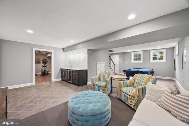 living area featuring indoor wet bar, recessed lighting, pool table, and baseboards