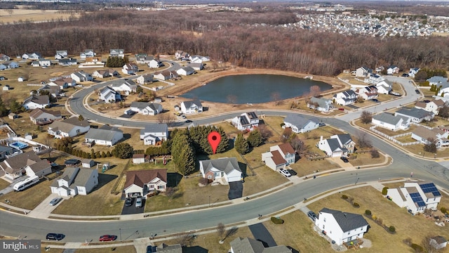 aerial view featuring a residential view and a water view