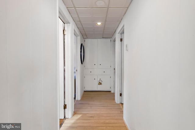 corridor with light wood-style flooring