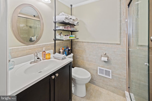 full bathroom featuring vanity, visible vents, ornamental molding, tile walls, and toilet