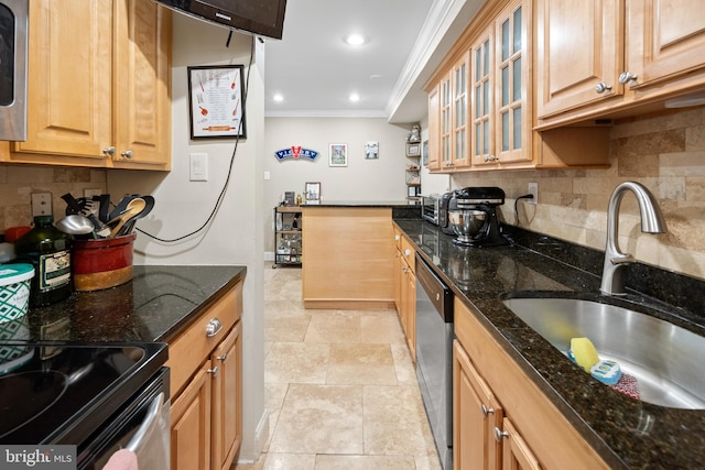 kitchen with a sink, dishwasher, ornamental molding, and dark stone countertops