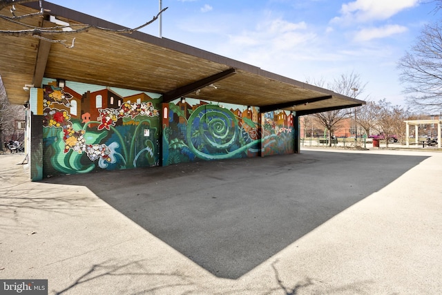 view of parking featuring a carport