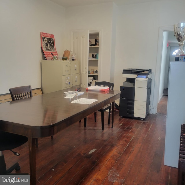 dining area featuring wood-type flooring