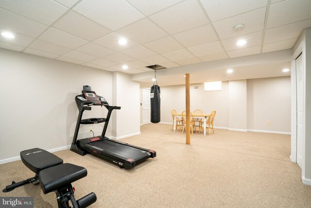 workout area with carpet flooring, recessed lighting, baseboards, and a drop ceiling