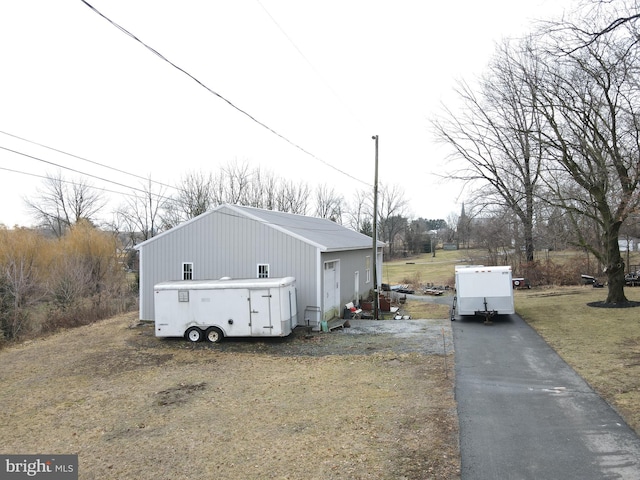 exterior space featuring an outdoor structure