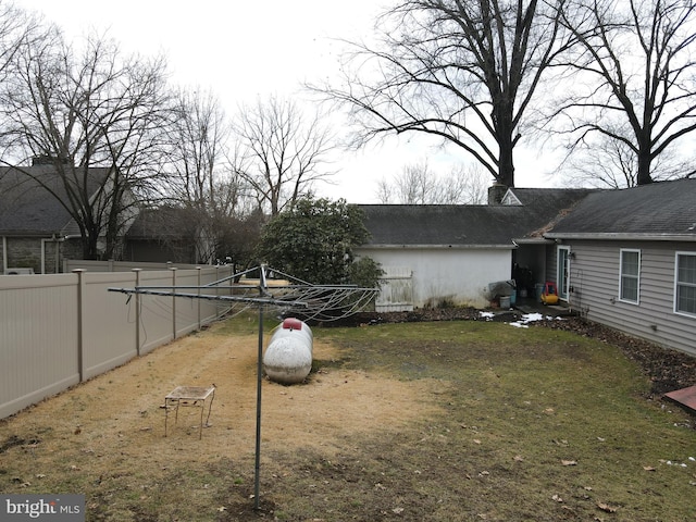 view of yard with fence