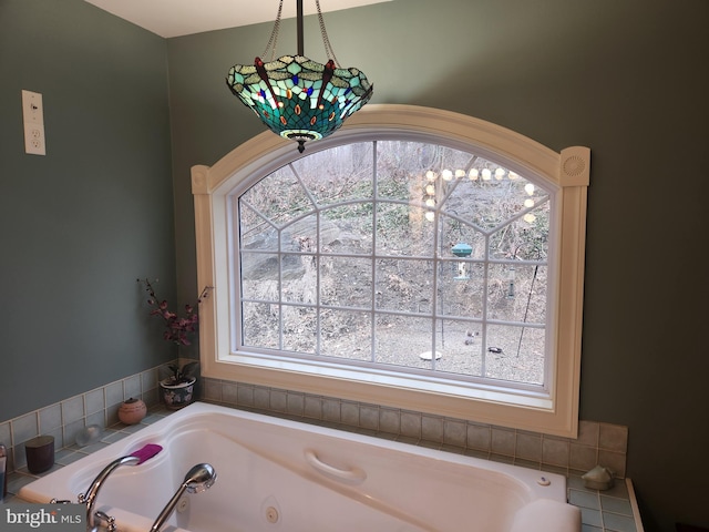 bathroom with a whirlpool tub