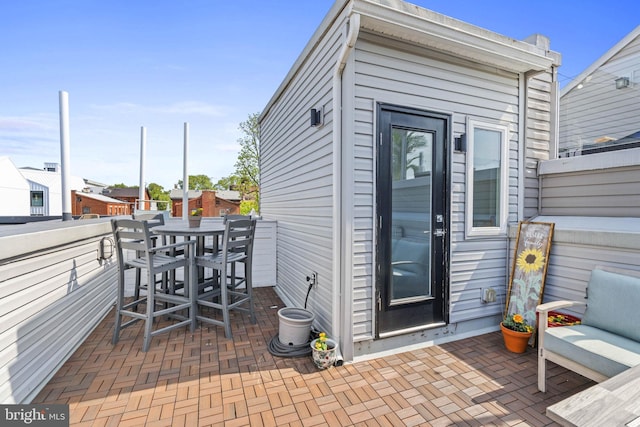 exterior space with outdoor dining area