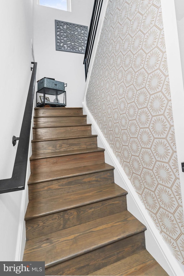 stairway with baseboards