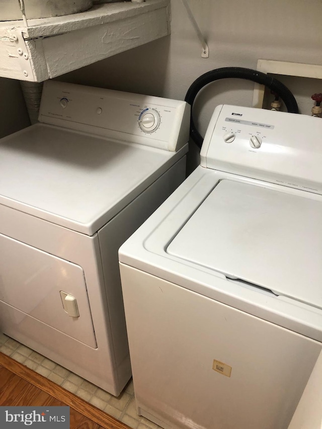 laundry area with washer and dryer and laundry area