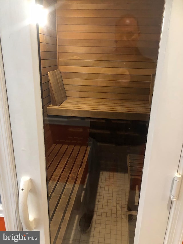 view of sauna featuring tile patterned floors