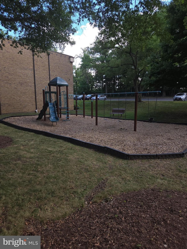 communal playground with a yard