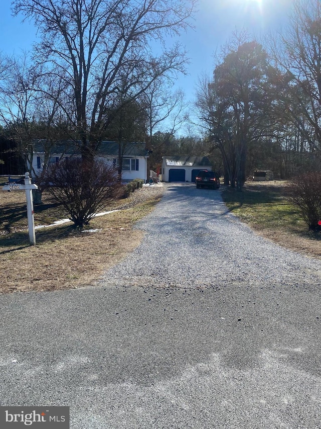 view of road with driveway