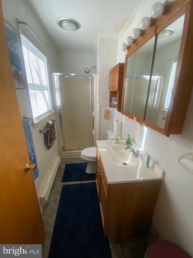 full bath with tile patterned floors, a shower stall, toilet, and vanity