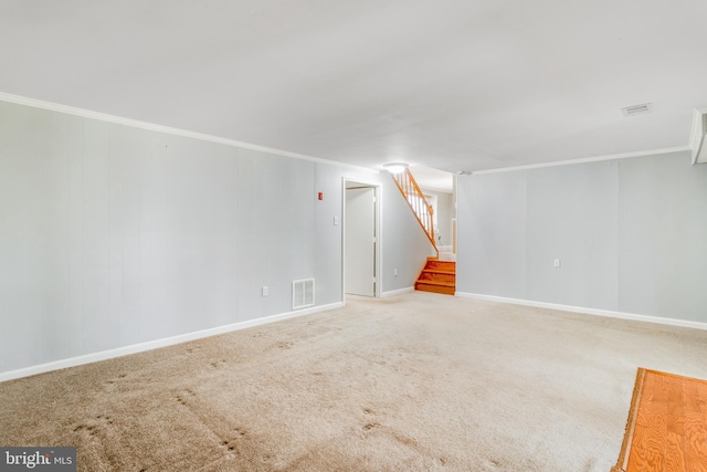 interior space with stairs, visible vents, carpet flooring, and crown molding