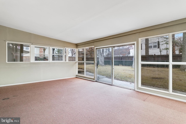 unfurnished sunroom with a healthy amount of sunlight