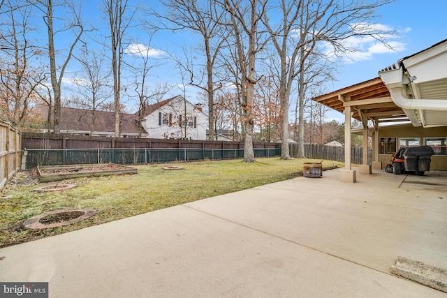 exterior space featuring area for grilling and a fenced backyard