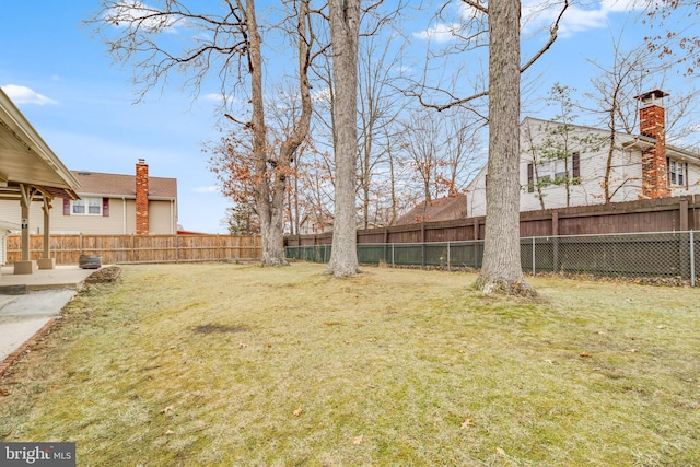 view of yard featuring a fenced backyard