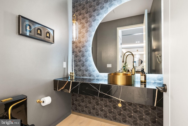 bathroom featuring wood finished floors