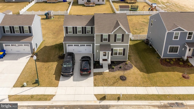 drone / aerial view featuring a residential view