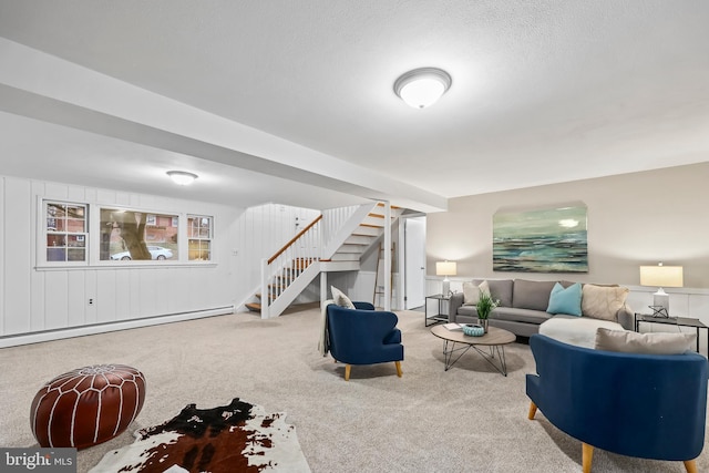 living room featuring a textured ceiling, stairway, carpet floors, and a baseboard radiator