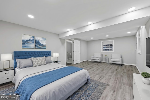 bedroom with recessed lighting, baseboards, and wood finished floors