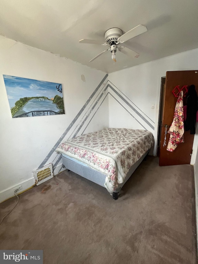 bedroom featuring a ceiling fan and carpet floors