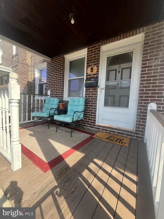 wooden deck with covered porch