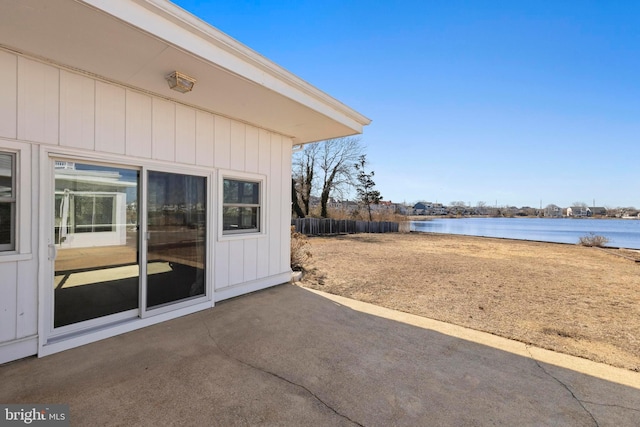 view of patio / terrace with a water view