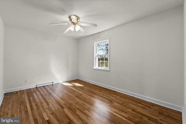 unfurnished room with baseboards, hardwood / wood-style flooring, ceiling fan, and a baseboard radiator