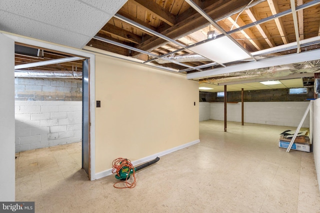 unfinished basement with tile patterned floors