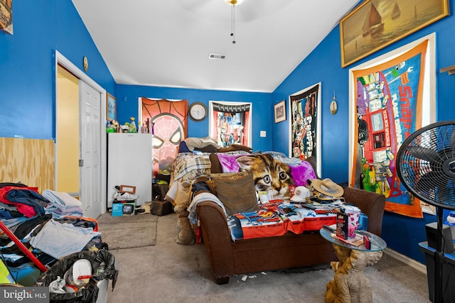 bedroom featuring visible vents, lofted ceiling, and ceiling fan