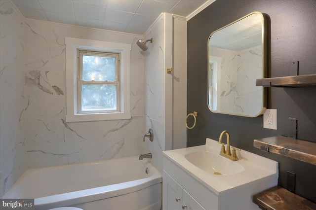 bathroom featuring bathtub / shower combination, vanity, and crown molding